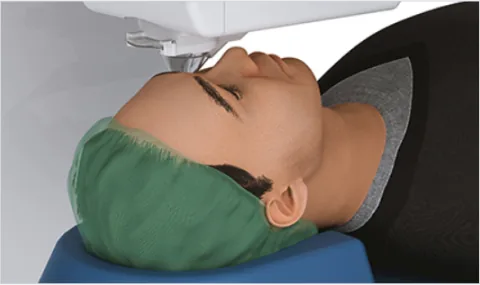 Patient lying under a laser system during vision correction surgery in Seoul